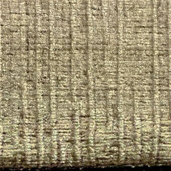 Beige woven fabric with vertical ribbed texture, dense structured weave, labeled “egoitaliano marlys 30,” neutral tone, granular spaces.
